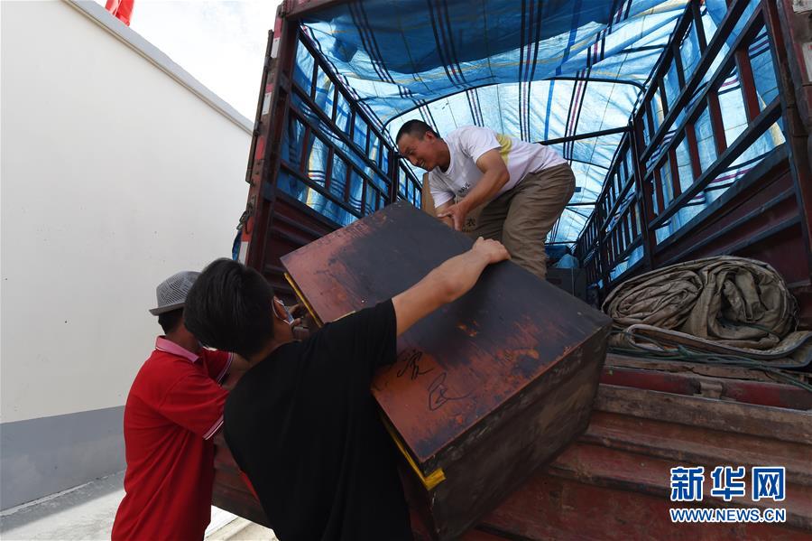 （新華全媒+）（26）千里“挪窩”，踏實開啟新生活