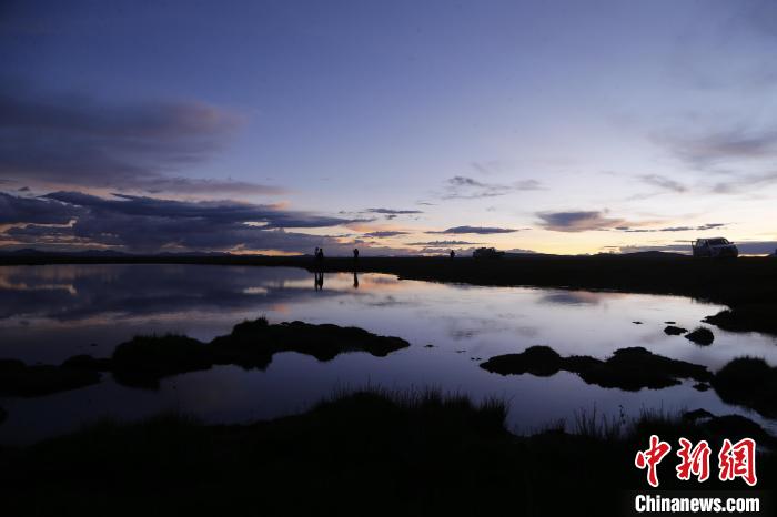 圖為夕陽下的查旦濕地?！●R銘言 攝